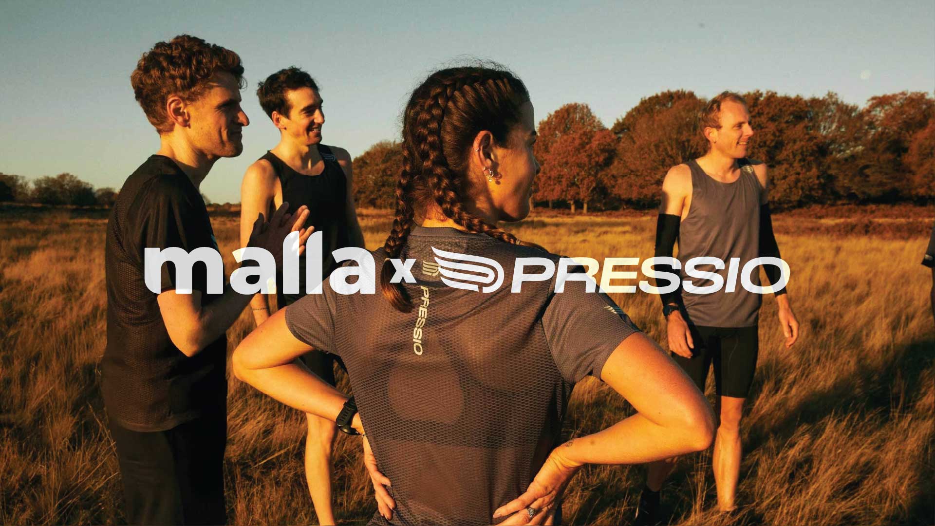 runners standing in a field